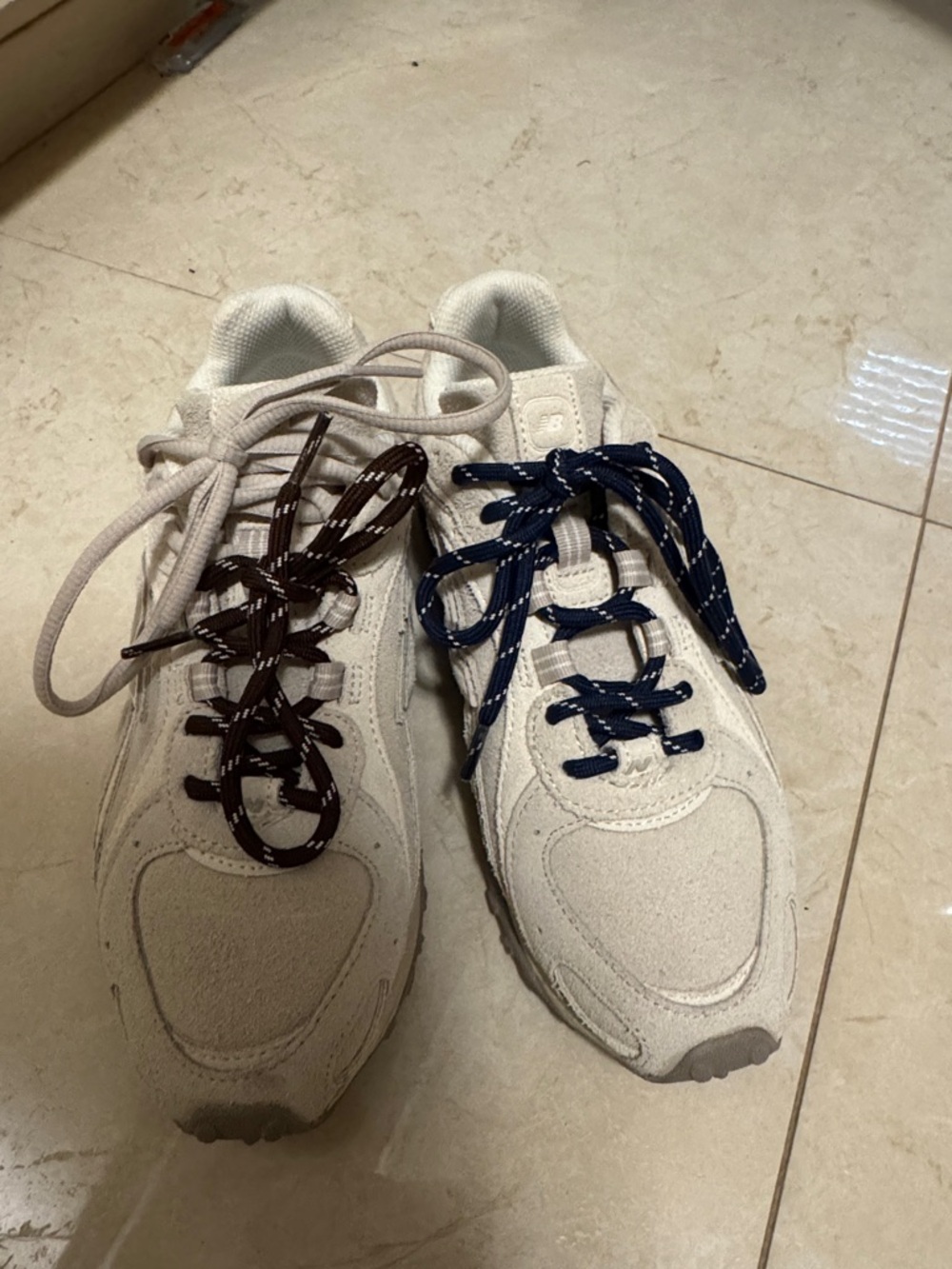 New Balance Beige Athletic Sneakers with Brown and Navy Laces